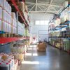 chemical production warehouse with shelves, totes